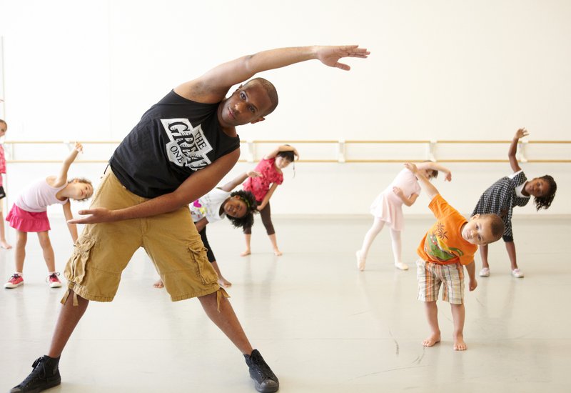 Nasir teaching kids to dance.